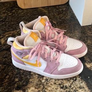 Like new Nike Air Jordan 1 Mid youth 2.5, Arctic Pink/University Gold.